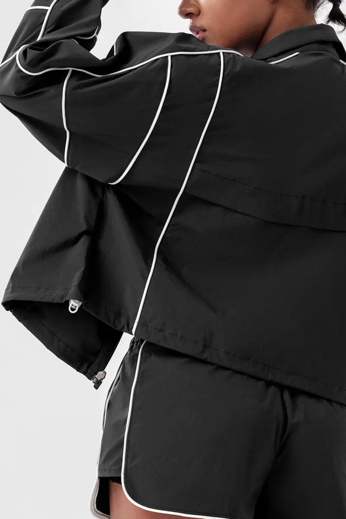 Women's Contrast Color Zip - up Quick - Dry Sports Jacket Black close-up of the left sleeve