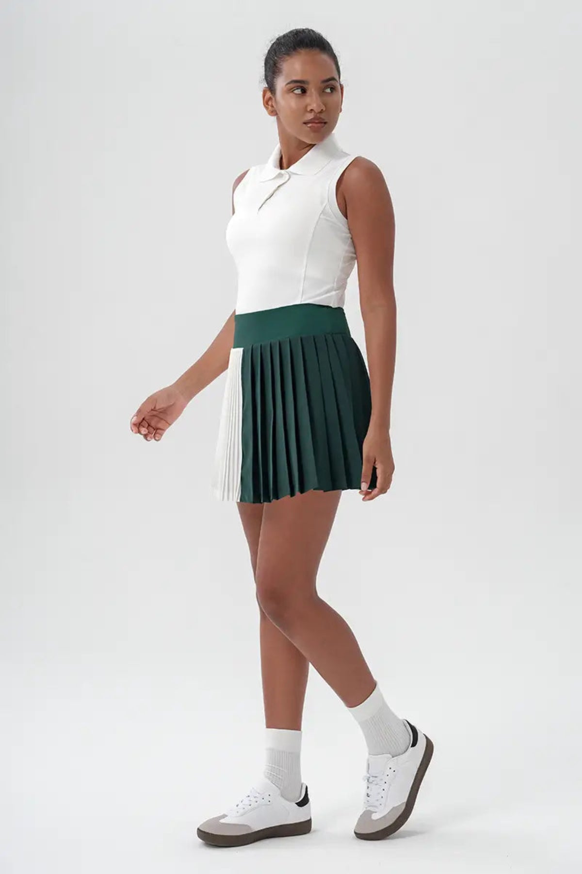 Sleeveless Golf & Tennis Polo shirt Women's White full body outfit display on the left