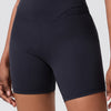 Short de sport taille haute à poches pour femme