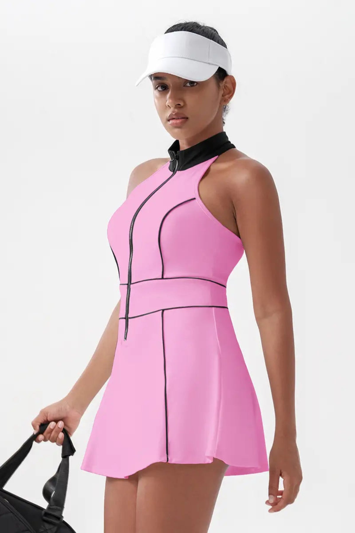 Women's Sleeveless Tennis Dress with Built-In Shorts Hot Pink close-up on the left side