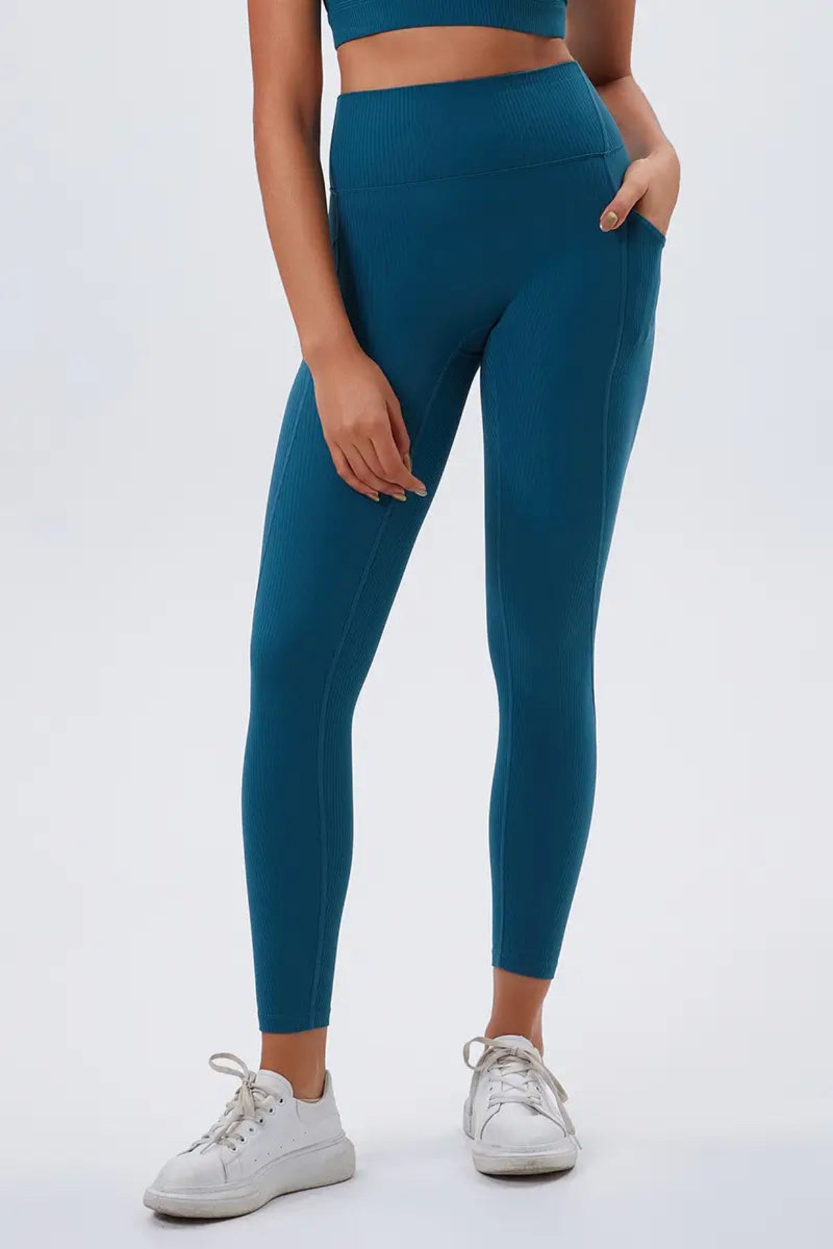 Eco-friendly High-Waisted Leggings with Side Pockets Navy Blue close-up from the front