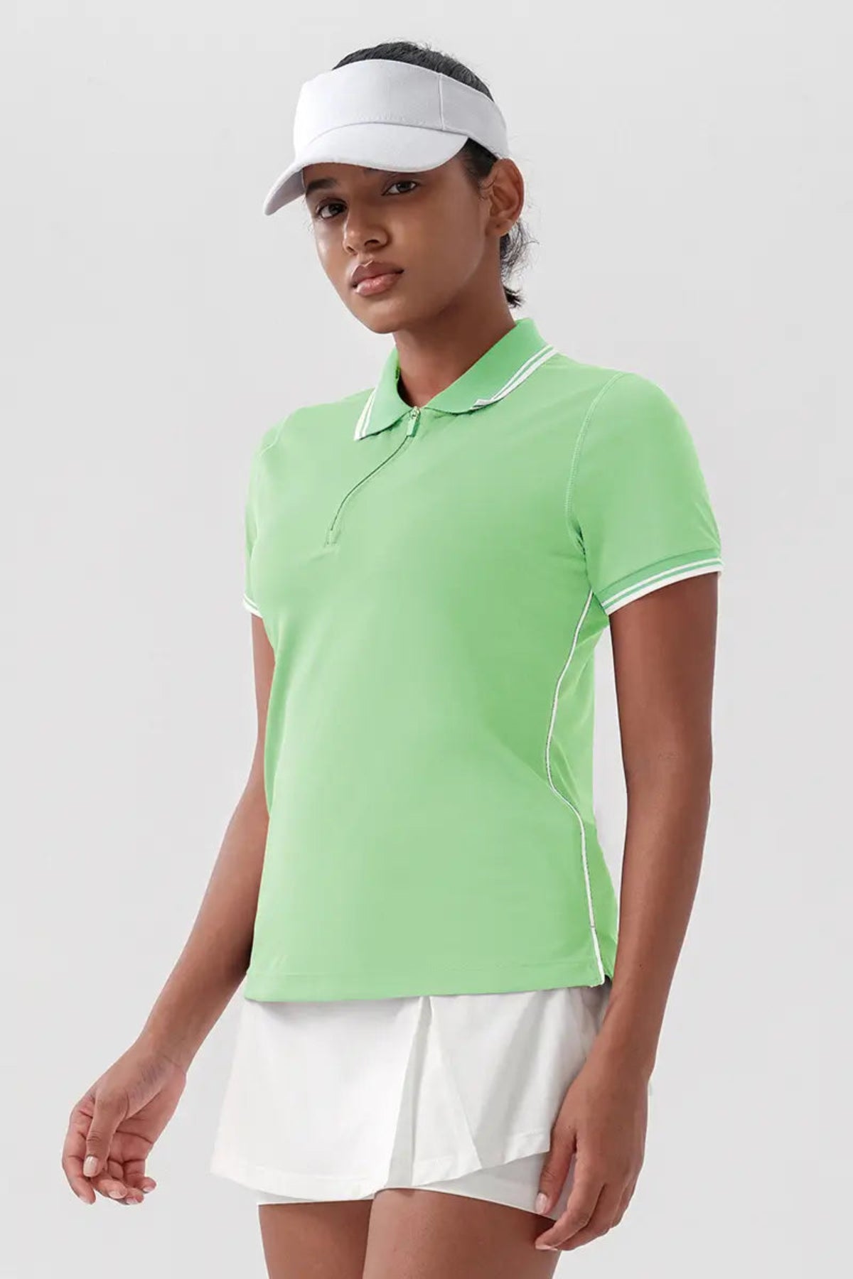 Women's Quick-Dry Tennis Polo Shirt Light Green close-up on the left front