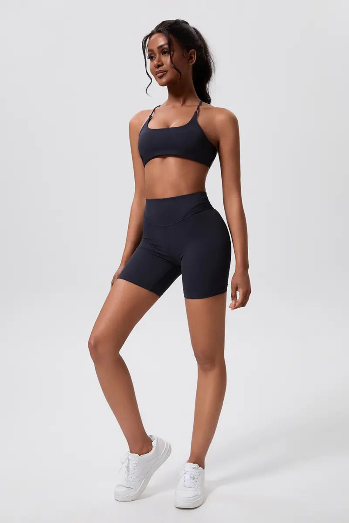 Women’s High-Waisted Pocket Sports Shorts Pants Black full body outfit display on the left front