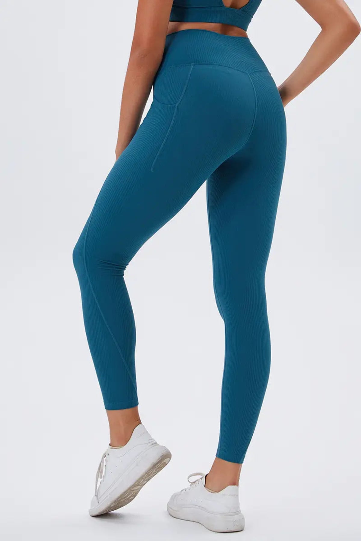 Eco-friendly High-Waisted Leggings with Side Pockets Navy Blue Close up of buttocks and legs